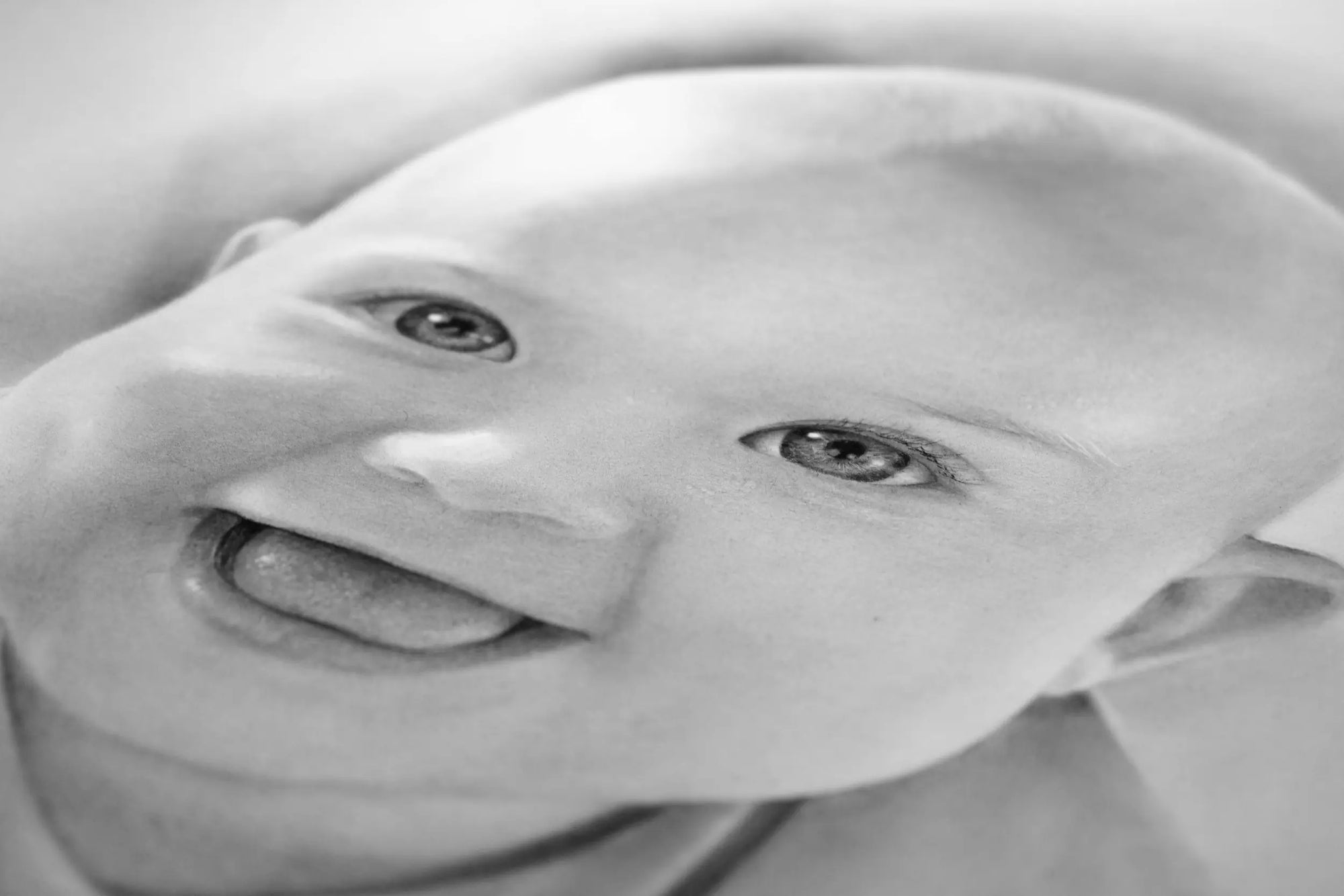 Large pencil drawing portrait of a baby